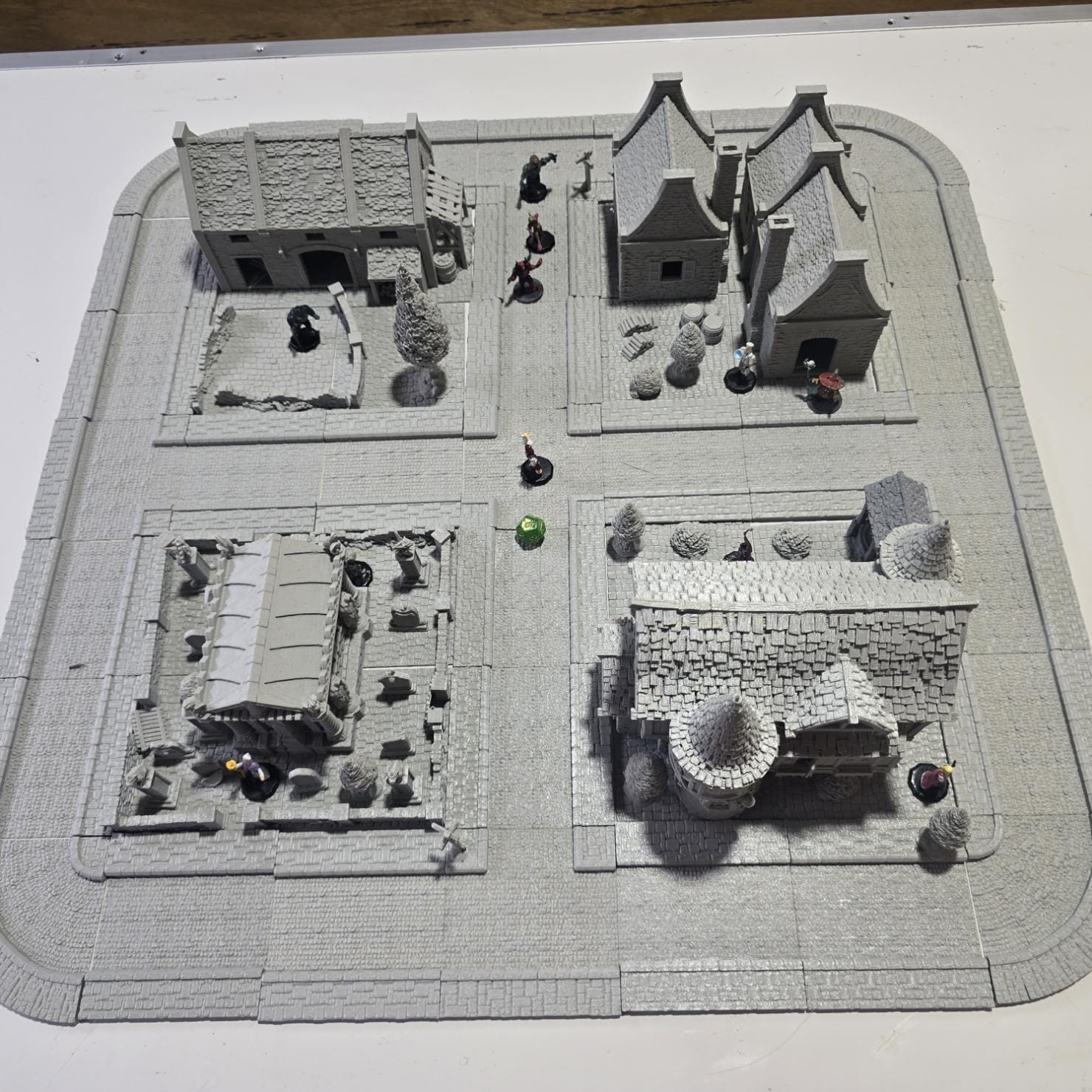 Step into the Greendale Colonial Village, a fully playable 28mm tabletop town. With cobblestone streets, detailed scatter, and four unique starter blocks, this set is ready for storytelling straight out of the box — and fully expandable with 25+ future buildings, a castle, and fortifications.