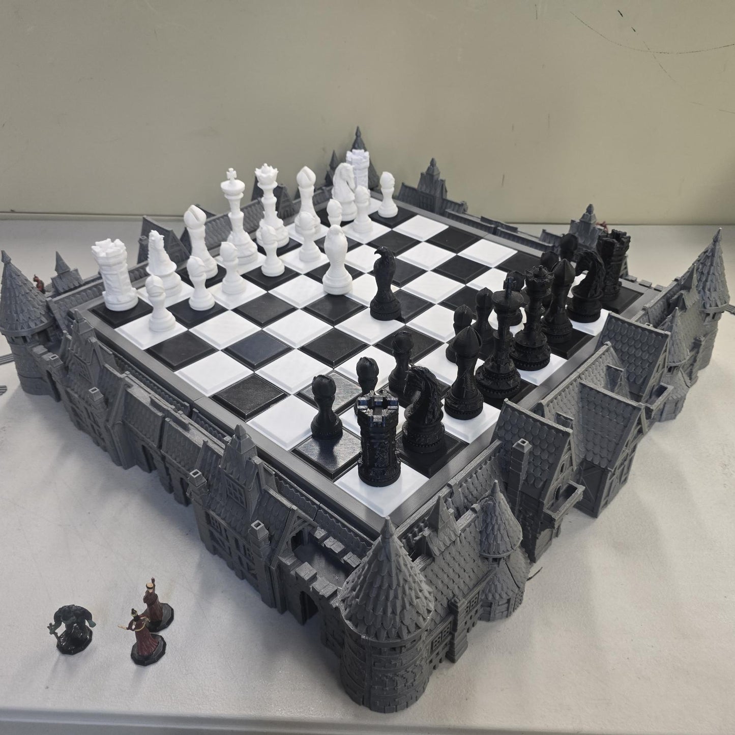 Complete Royal Battle Board medieval castle chess set with raised black and white tile board inside detailed fortress base